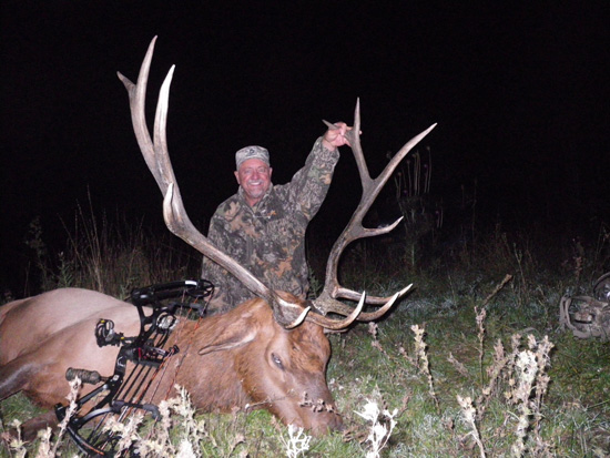 Billy Moore with bull 
	  Elk he shot in CO with his bow.